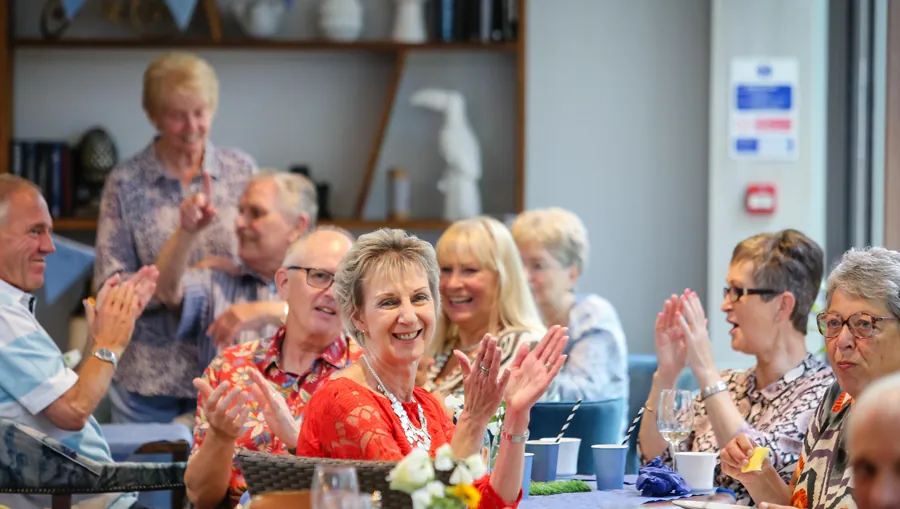 Applause during a community lunch