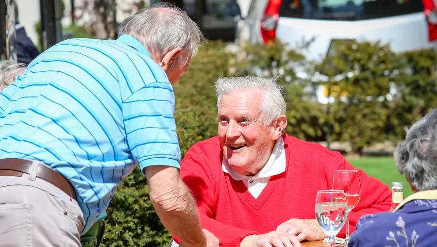 Residents chatting in the garden